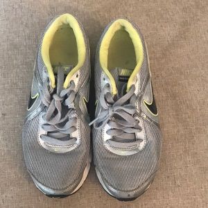 Grey and yellow Nike shoes